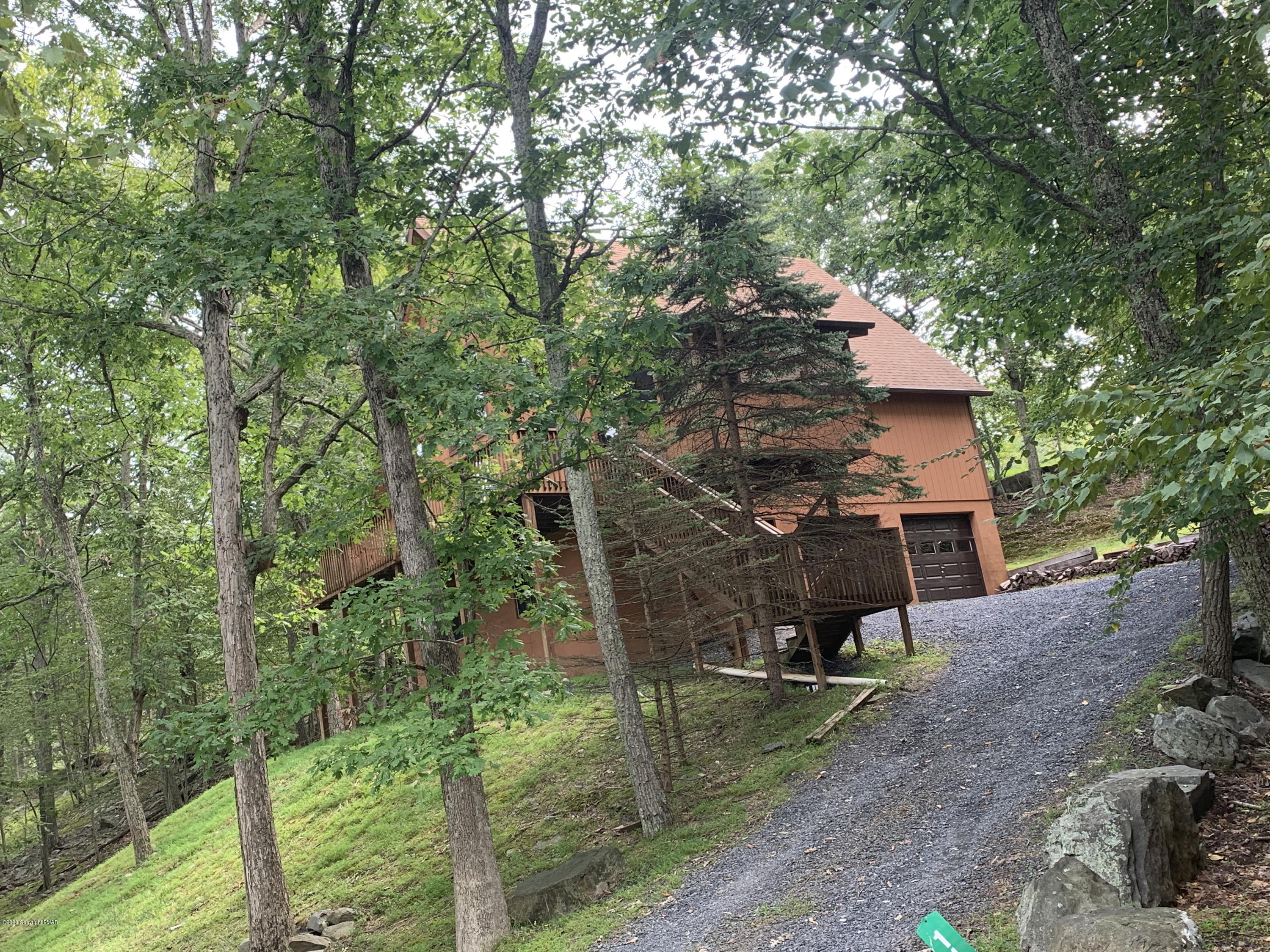 1108 Hampstead Road Bushkill, PA 18324 - Photo 1 of 34 a view of a house with a yard
