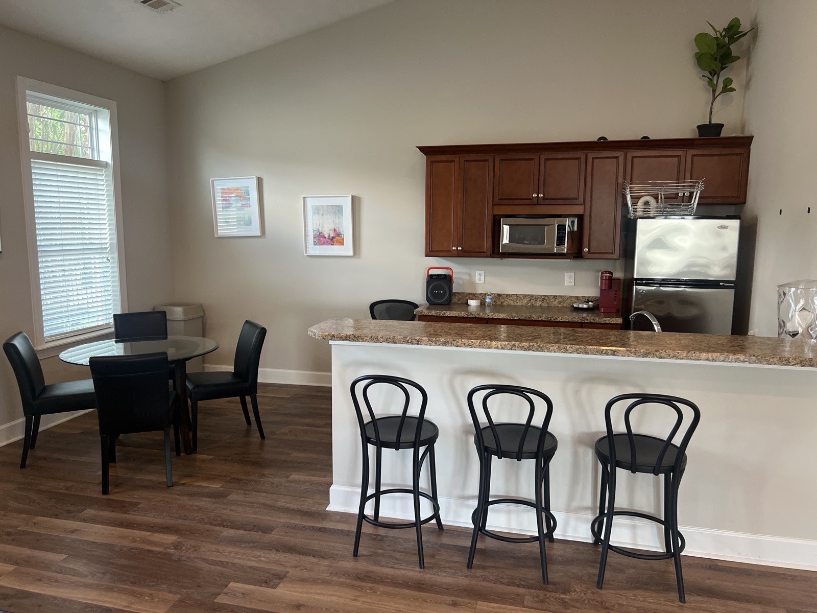 1000 Wells Way Spring Hill, TN 37174 - Photo 17 of 20 a view of a dining room with furniture and wooden floor