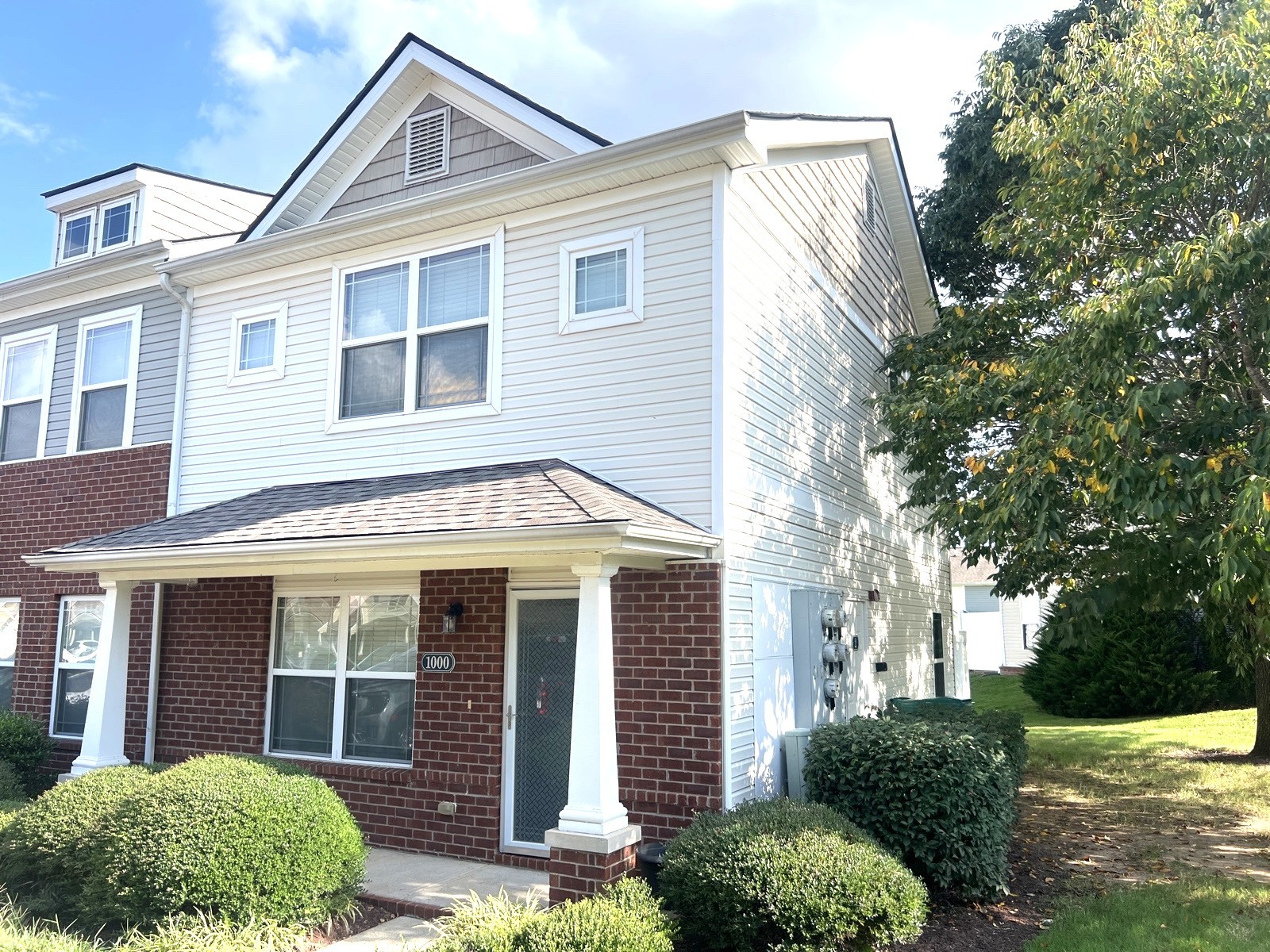 1000 Wells Way Spring Hill, TN 37174 - Photo 2 of 20 a front view of a house with garden