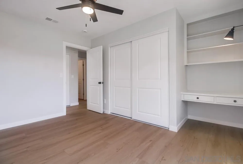 8174 Sunset Road Lakeside, CA 92040 - Photo 26 of 46 wooden floor in an empty room with a window