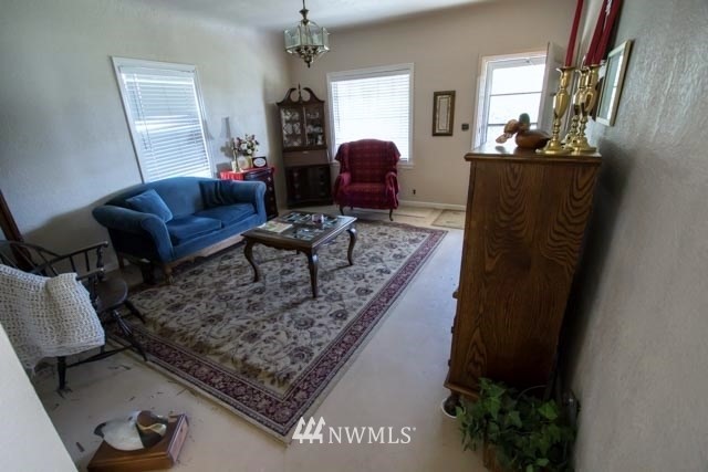 631 Shea Road Waitsburg, WA 99361 - Photo 3 of 15 a living room with furniture and a fireplace