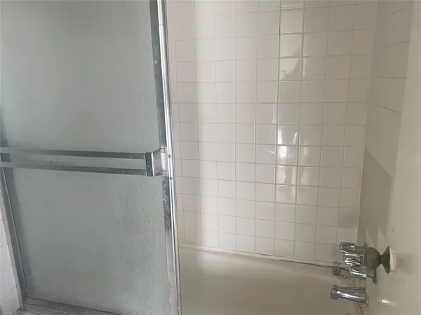 a bathroom with double sink and mirror