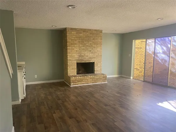 a living room with fireplace