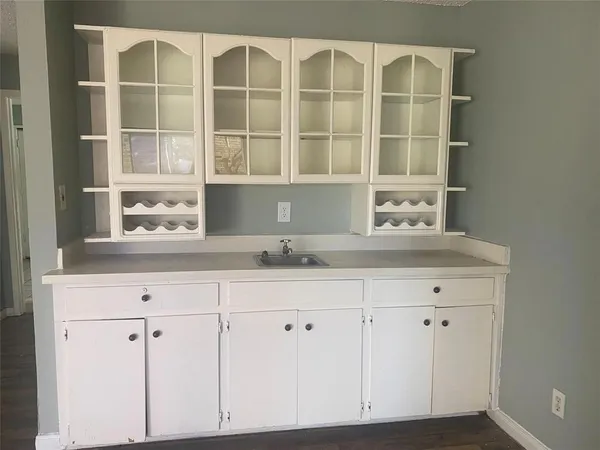 a bathroom with a toilet and a sink
