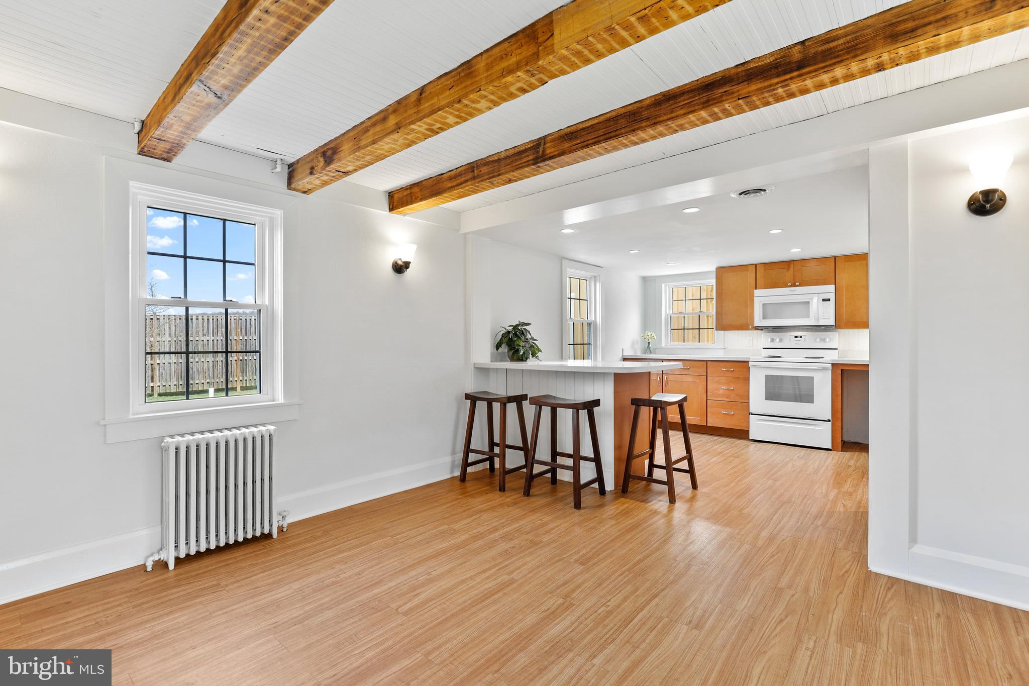 12525 Garrison Forest Road Owings Mills, MD 21117 - Photo 8 of 40 Kitchen table space plus breakfast bar