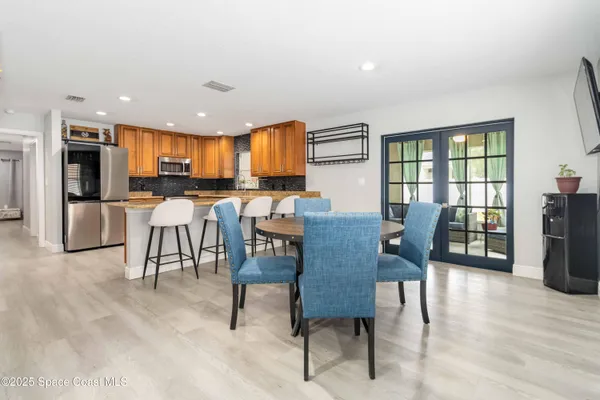 a view of a dining room with furniture