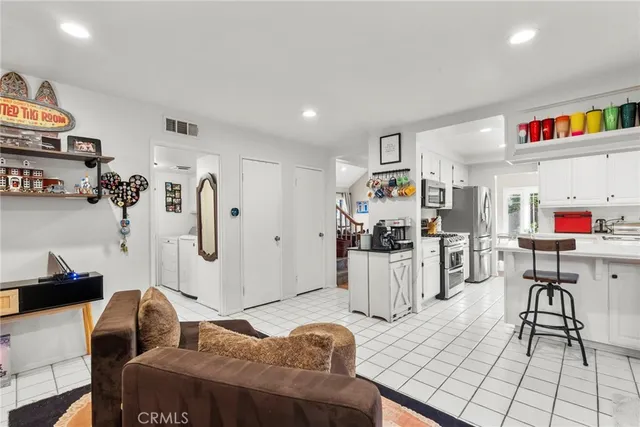 a living room with furniture and a couch