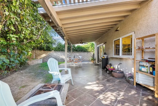 a backyard of a house with seating space