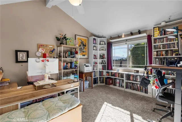 a room with furniture and a book shelf