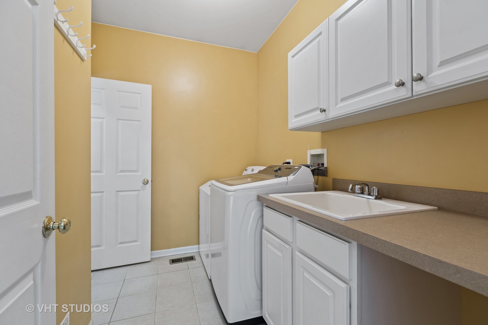 1920 Tyler Trail McHenry, IL 60051 - Photo 17 of 20 a utility room with a sink