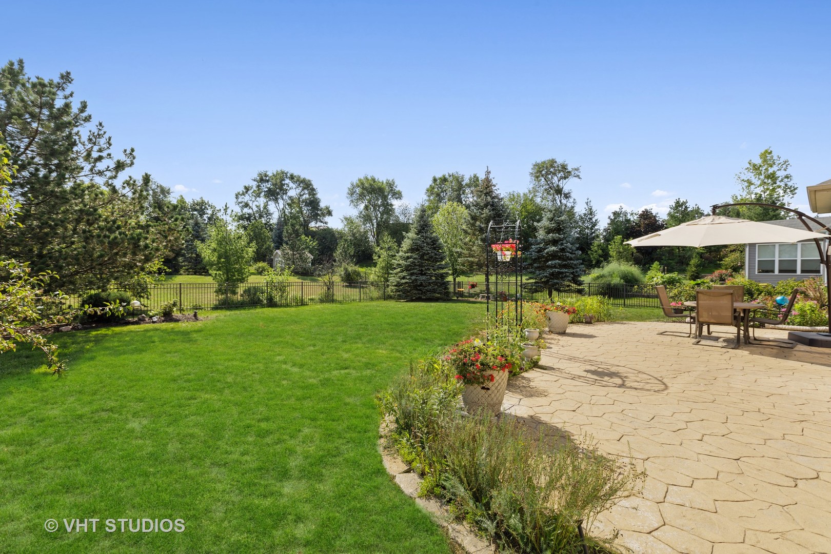 1920 Tyler Trail McHenry, IL 60051 - Photo 20 of 20 a swimming pool with outdoor seating and yard