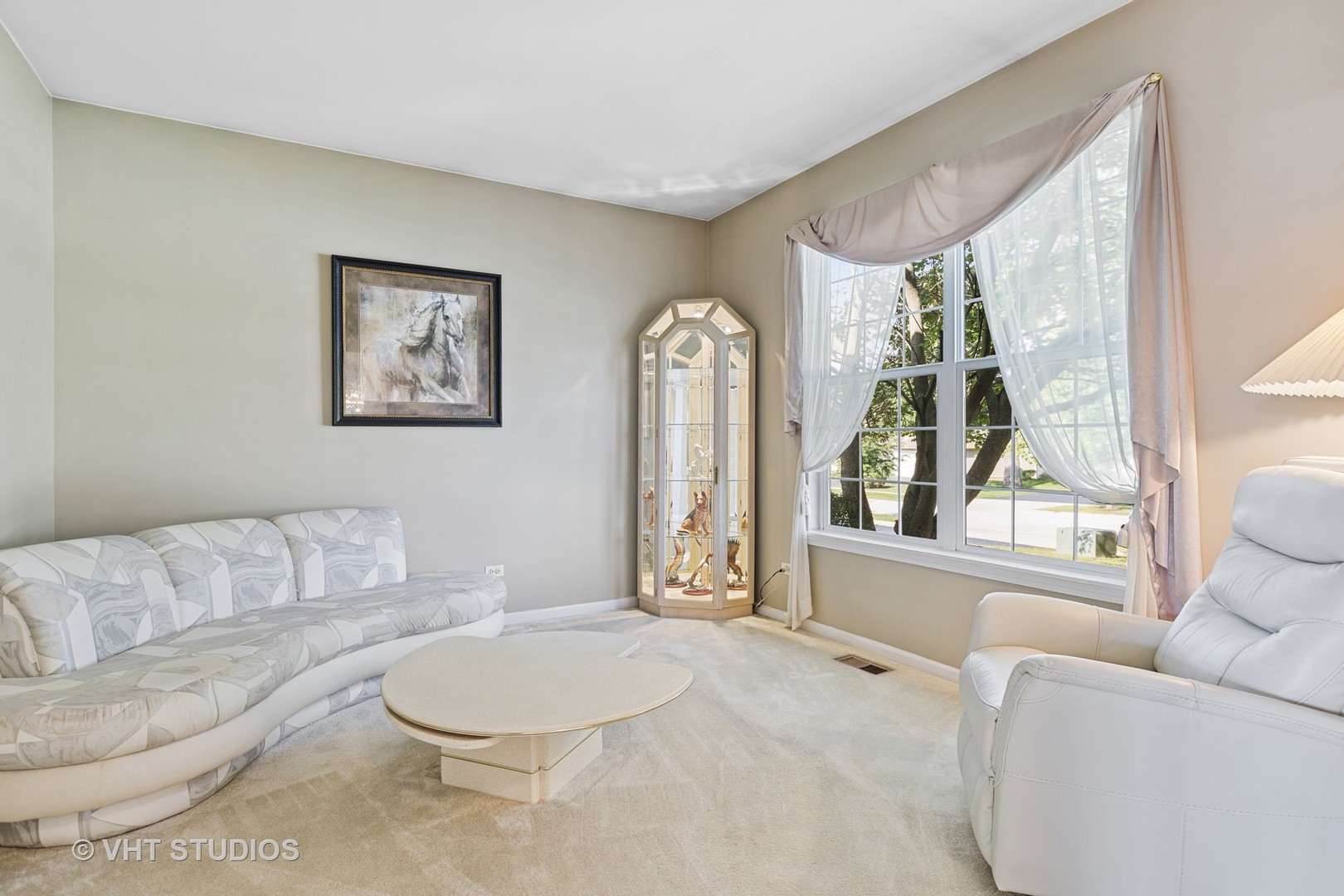 1920 Tyler Trail McHenry, IL 60051 - Photo 4 of 20 a living room with furniture and a large window