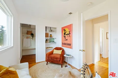 a living room with furniture and a couch