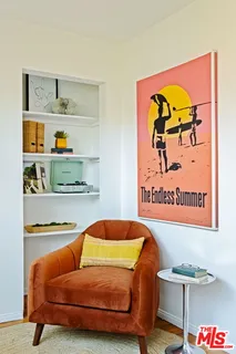 a bedroom with a bed and cupboard