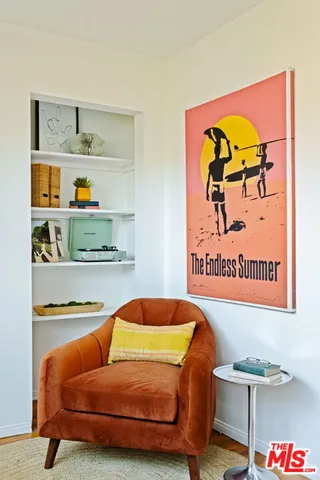 a bedroom with a bed and cupboard