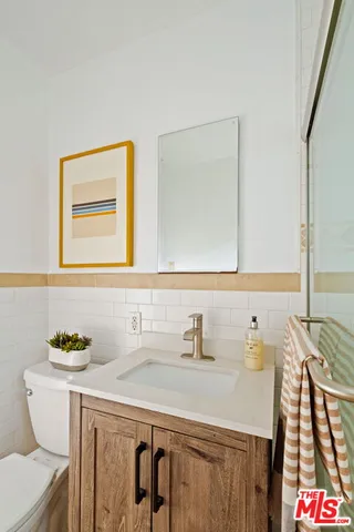 a bathroom with a sink and a toilet