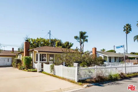 a front view of a house with a porch