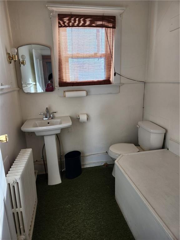 218 West Main Street Ligonier, PA 15658 - Photo 13 of 14 a bathroom with a toilet sink and mirror
