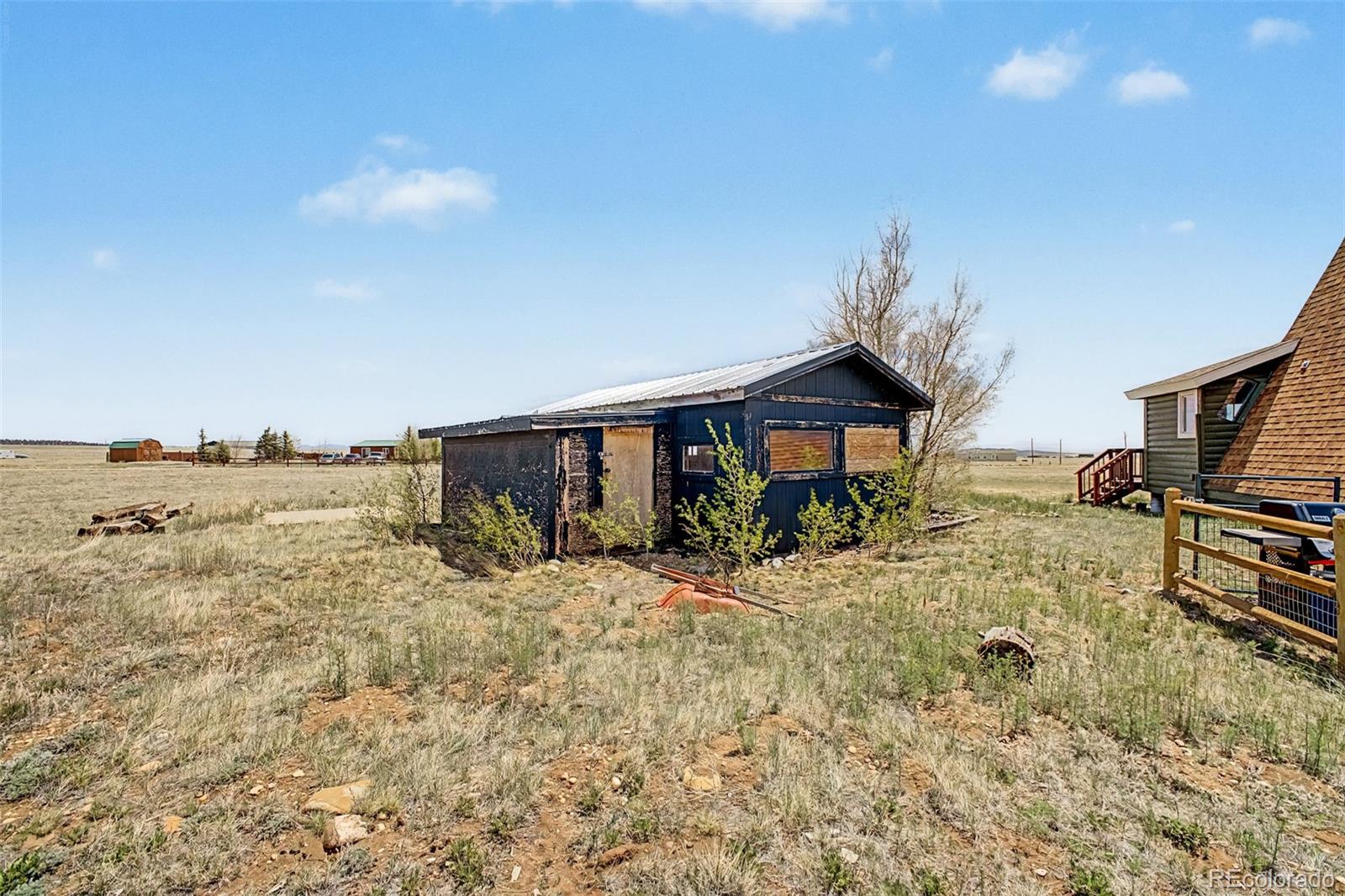 1365 Kokanee Road Fairplay, CO 80440 - Photo 25 of 45 a view of a house with a yard