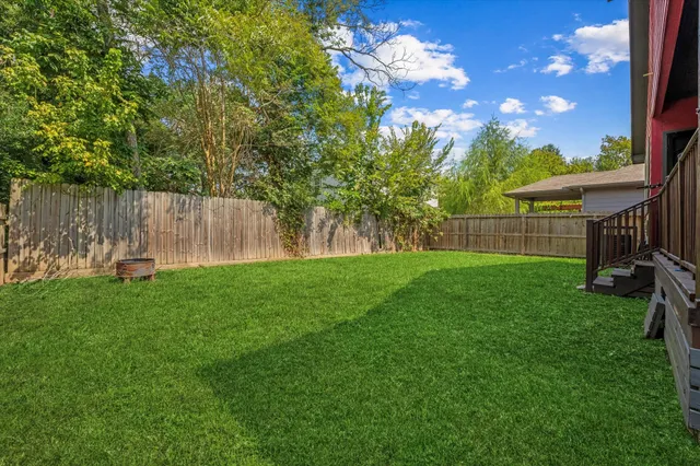 a view of a backyard with a garden