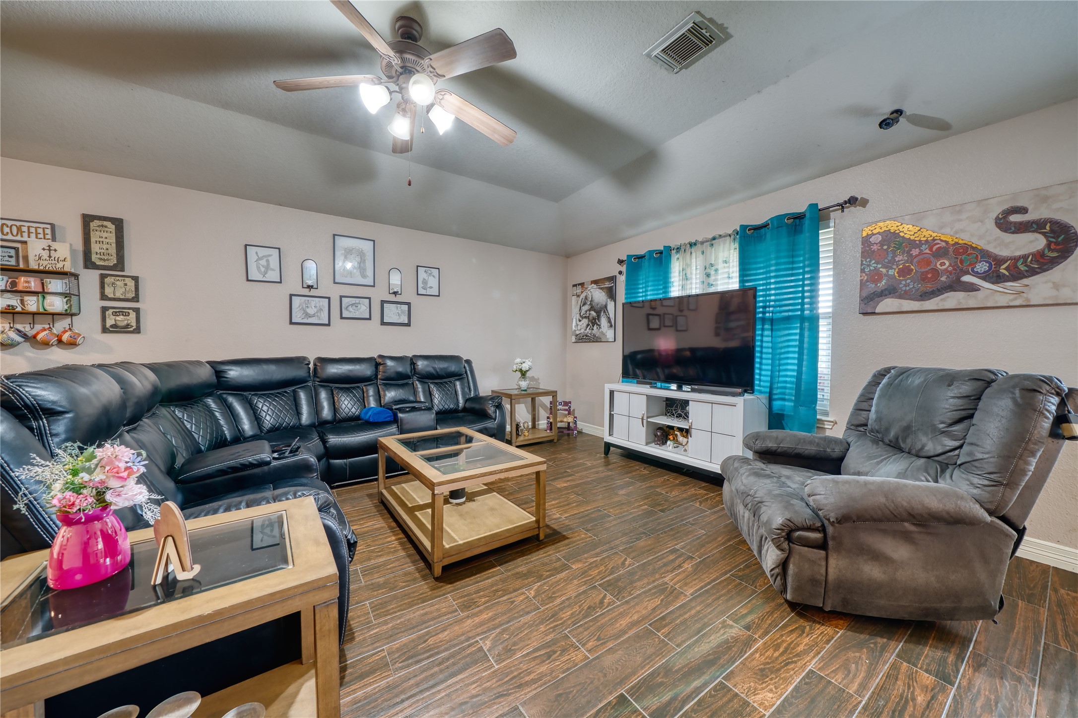2210 Mountain Ranch Drive Houston, TX 77049 - Photo 15 of 36 a living room with furniture and a flat screen tv