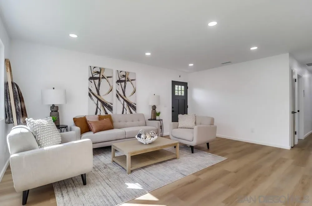 2821-25 Rosedale Way Spring Valley, CA 91977 - Photo 14 of 72 a living room with furniture and a ceiling fan