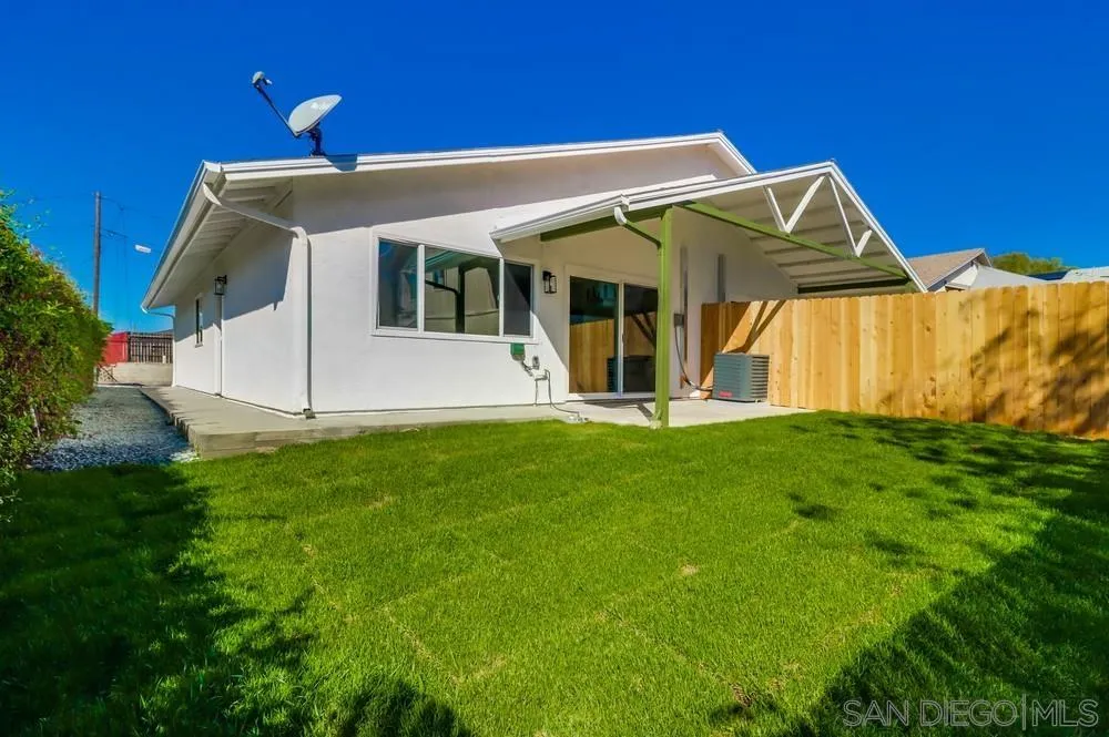 2821-25 Rosedale Way Spring Valley, CA 91977 - Photo 28 of 72 a view of a house with a backyard