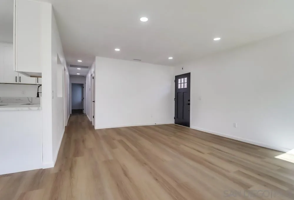 2821-25 Rosedale Way Spring Valley, CA 91977 - Photo 46 of 72 a view of an empty room with closet and a window