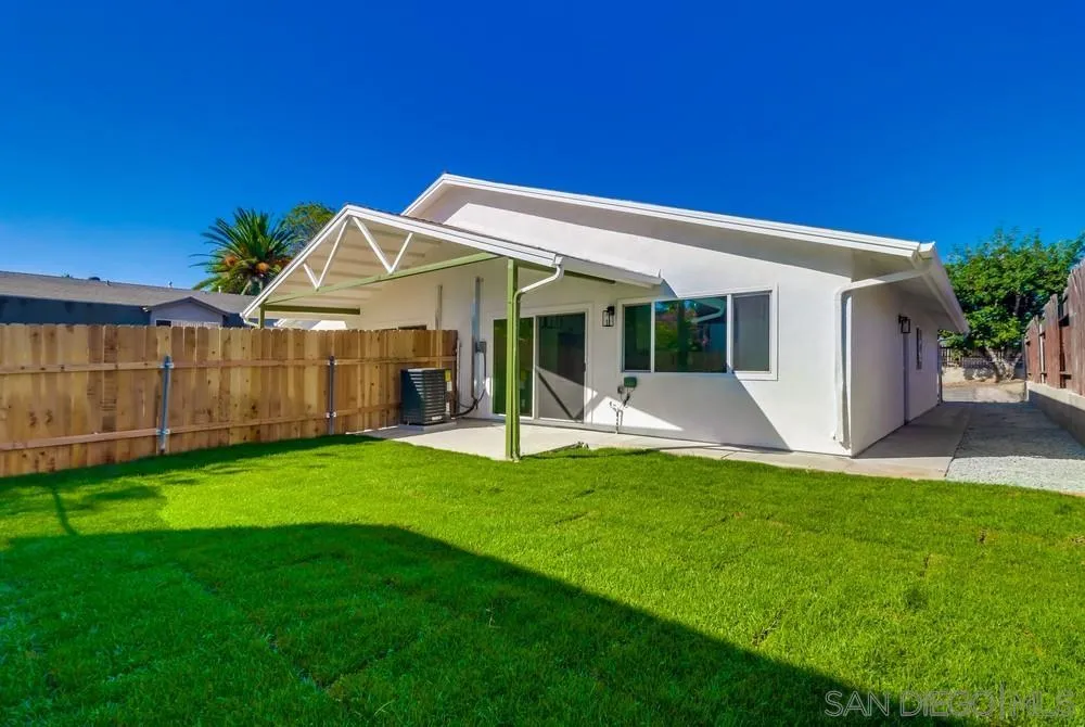 2821-25 Rosedale Way Spring Valley, CA 91977 - Photo 60 of 72 a view of a house with a backyard porch and sitting area
