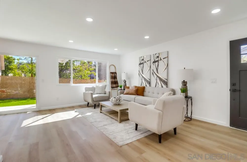 2821-25 Rosedale Way Spring Valley, CA 91977 - Photo 7 of 72 a living room with furniture and a flat screen tv