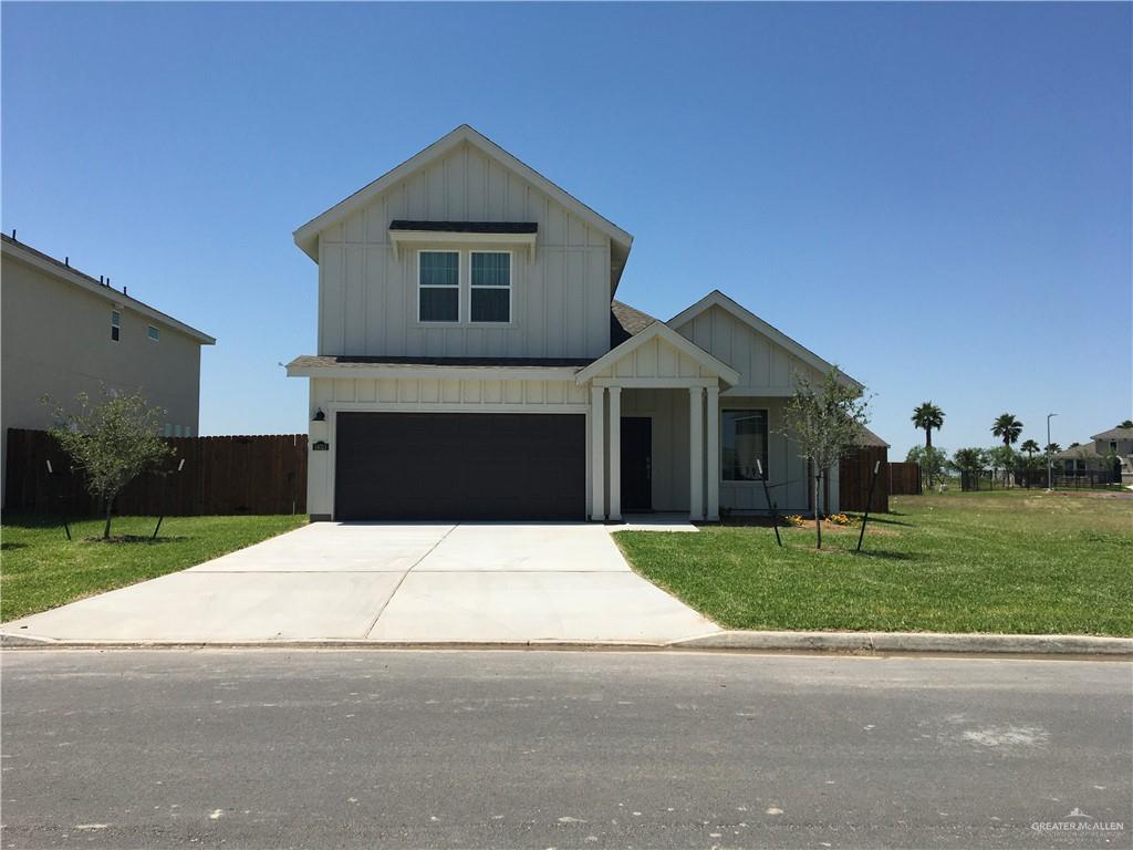 14119 Mylie Way McAllen, TX 78504 - Photo 5 of 29 a front view of a house with a yard and garage
