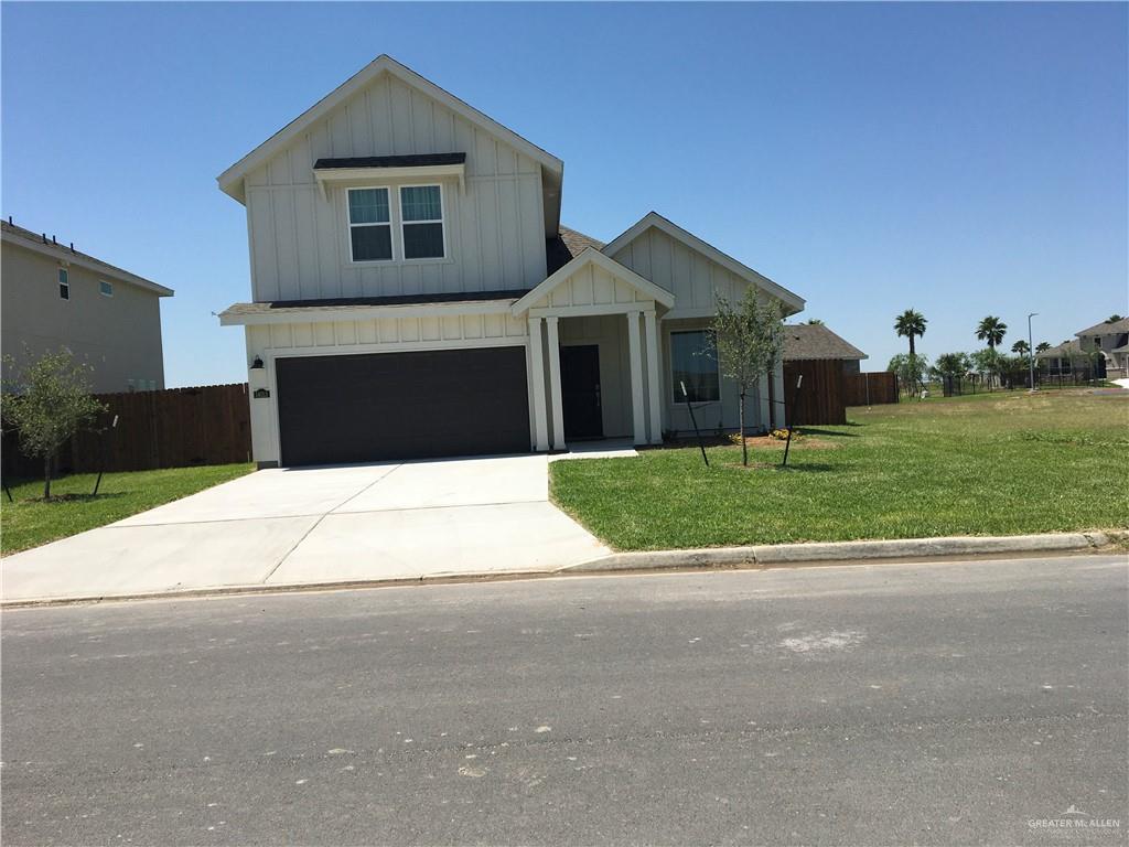 14119 Mylie Way McAllen, TX 78504 - Photo 6 of 29 a front view of a house with a yard and garage