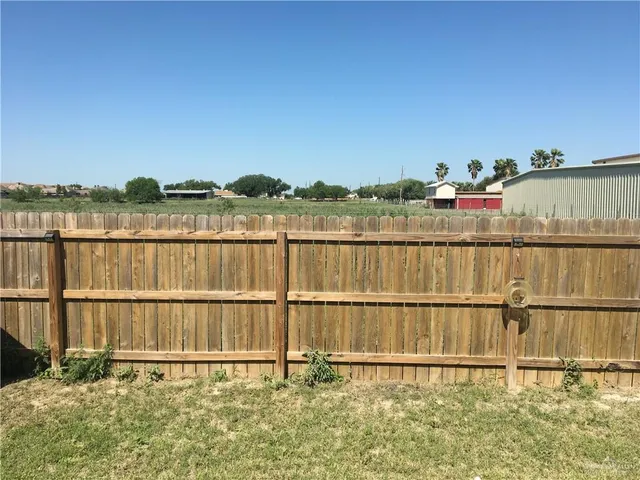 a view of a lake from a yard