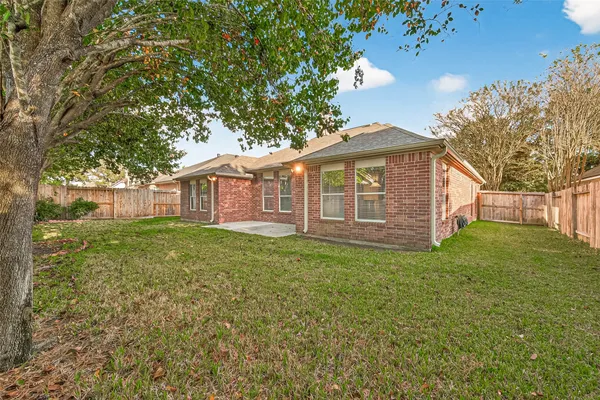 a view of a back yard of the house