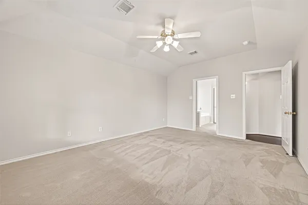 a bathroom with a tub sink and a mirror