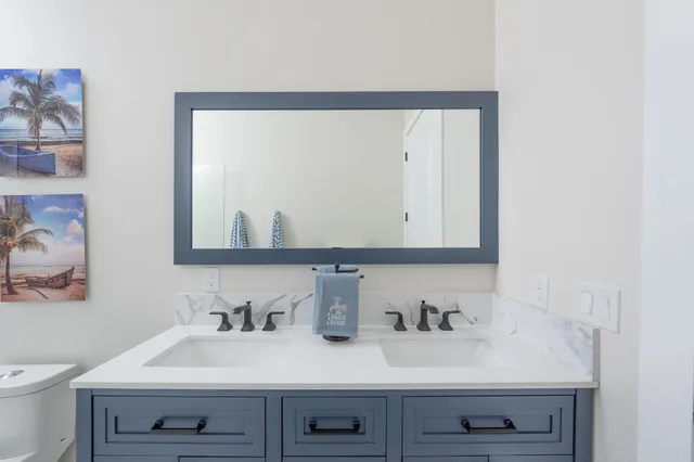 a view of a swimming pool with an outdoor seating and a yard