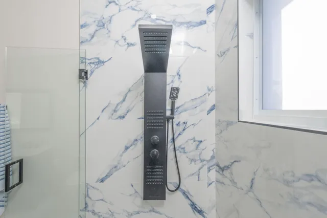 a view of a backyard with a garden and plants