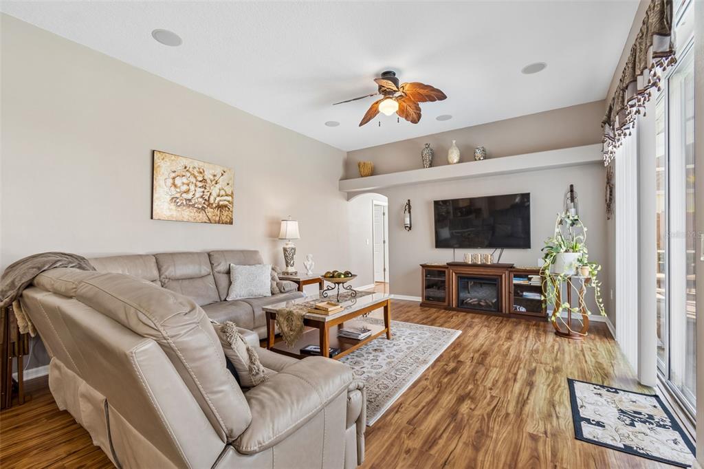 1602 Kish Boulevard Trinity, FL 34655 - Photo 45 of 65 a living room with furniture and a flat screen tv