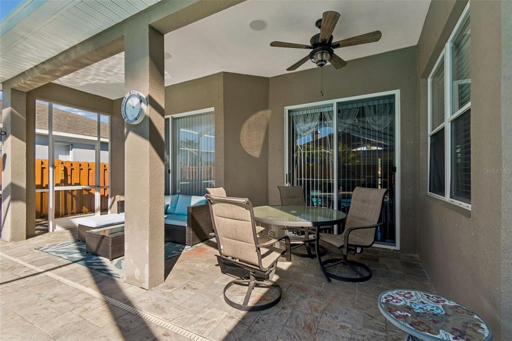 1602 Kish Boulevard Trinity, FL 34655 - Photo 57 of 65 a view of a livingroom with furniture and a floor to ceiling window