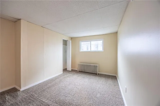 a view of livingroom with white walls
