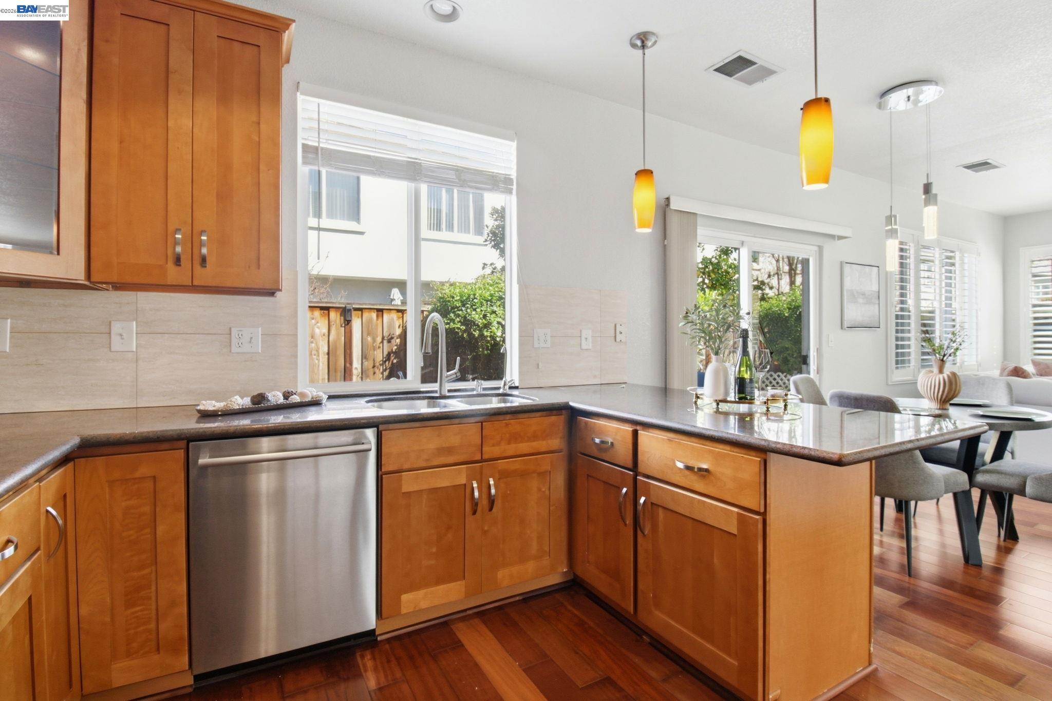 672 Greylyn Drive San Ramon, CA 94583 - Photo 12 of 35 a kitchen with a sink cabinets and window