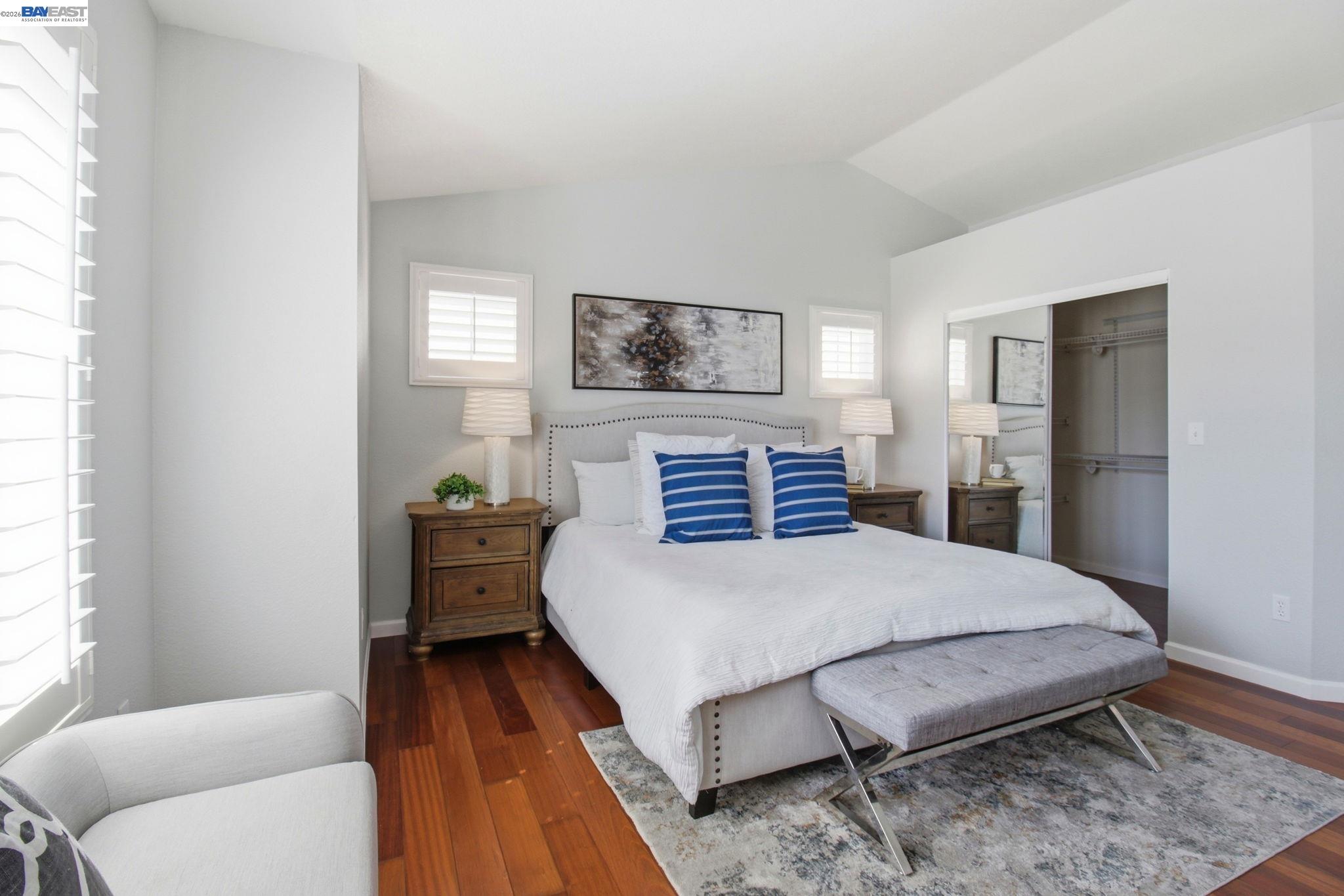 672 Greylyn Drive San Ramon, CA 94583 - Photo 23 of 35 a bedroom with a bed and wooden floor