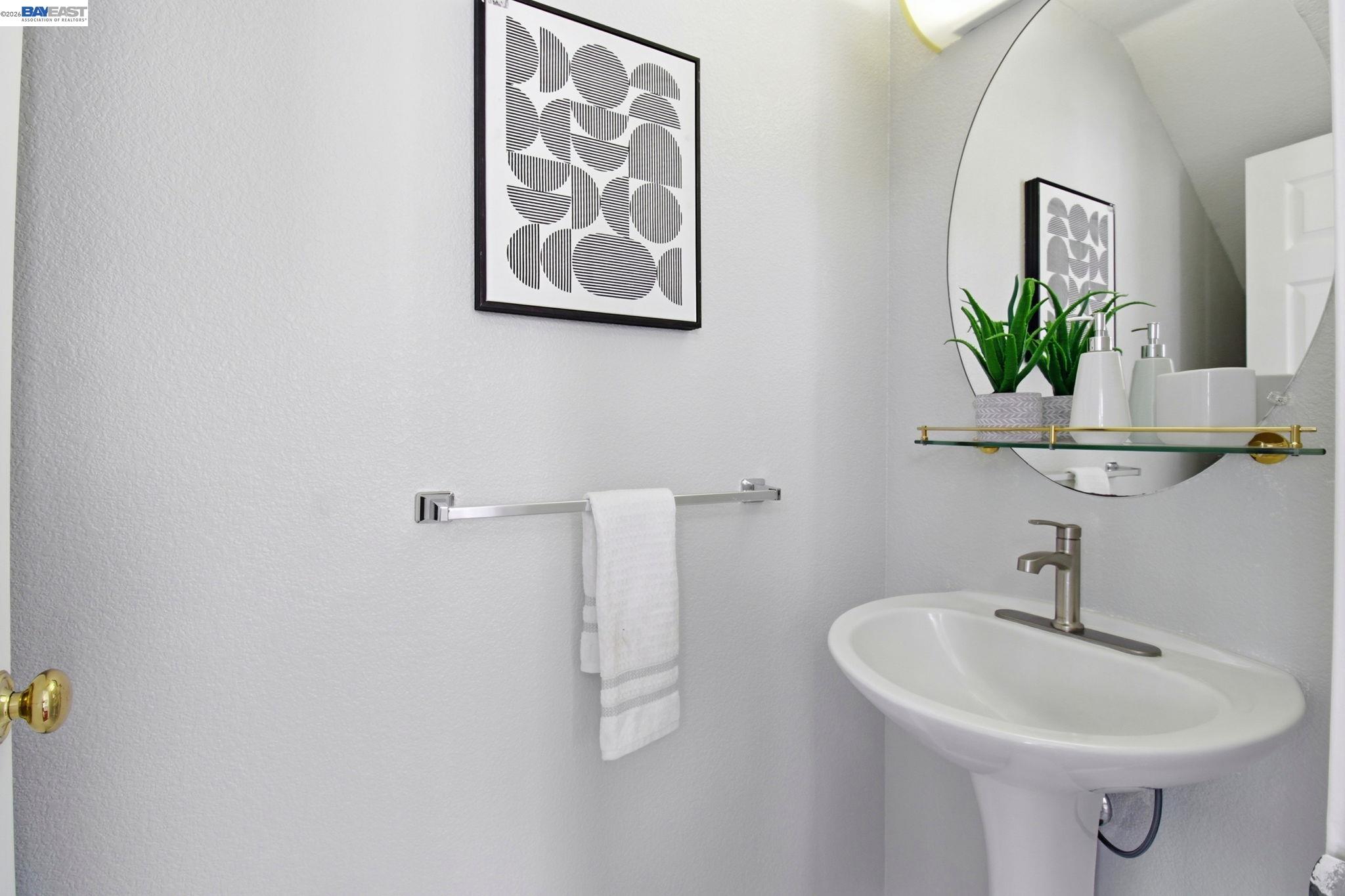 672 Greylyn Drive San Ramon, CA 94583 - Photo 27 of 35 a bathroom with a sink and a mirror