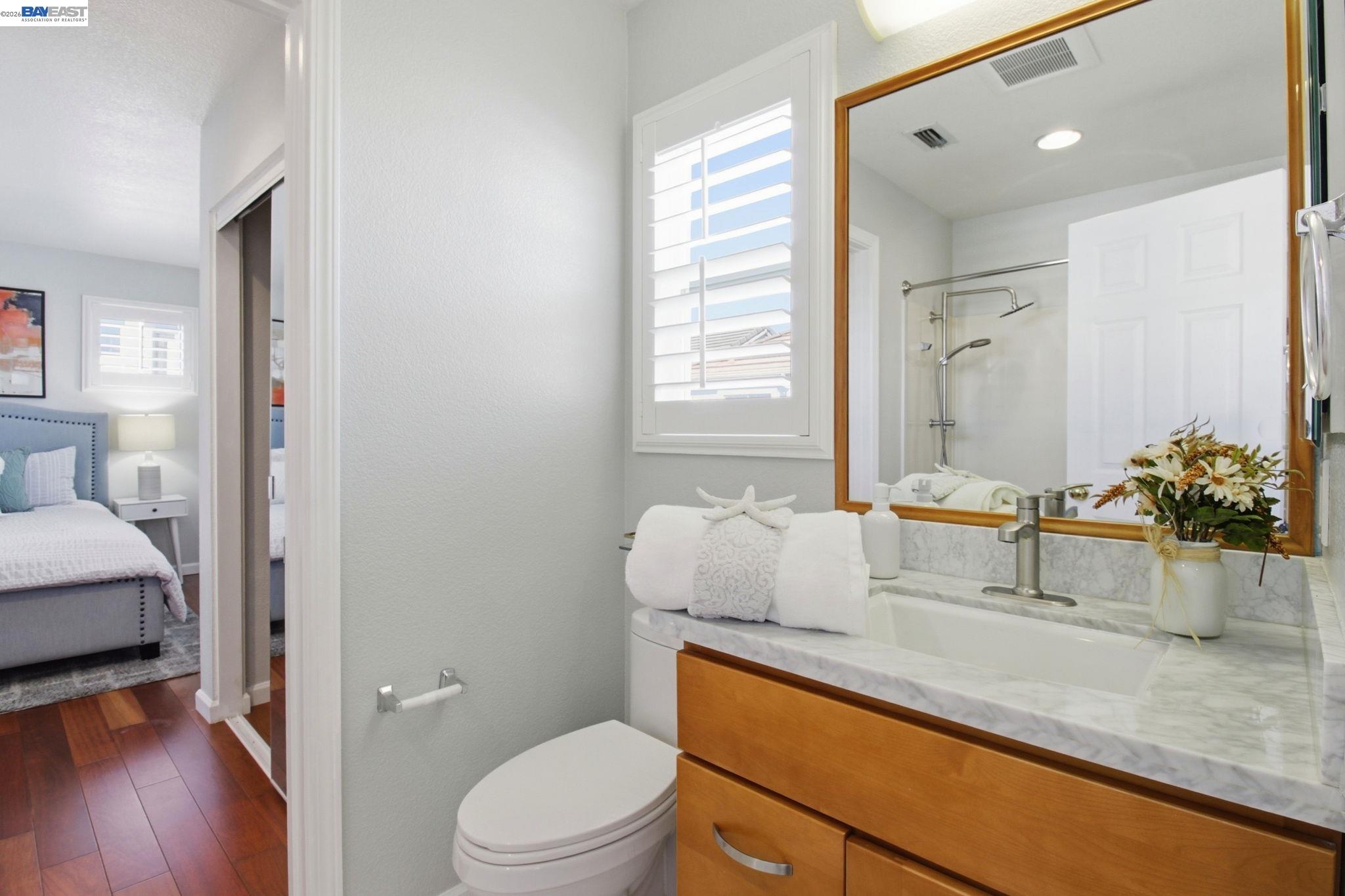 672 Greylyn Drive San Ramon, CA 94583 - Photo 28 of 35 a bathroom with a sink a toilet and shower
