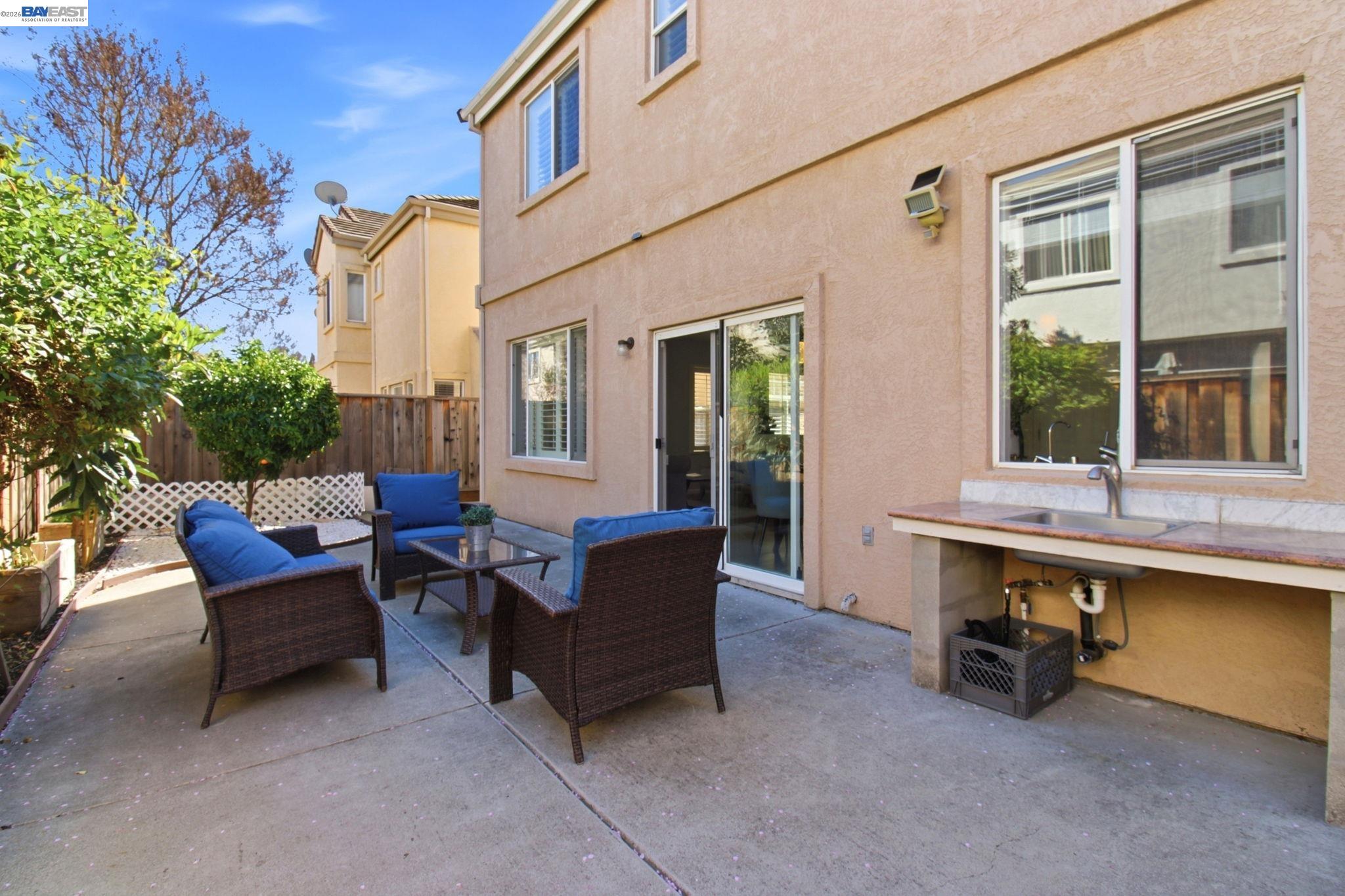 672 Greylyn Drive San Ramon, CA 94583 - Photo 34 of 35 a view of a patio with couches chairs and table in the patio