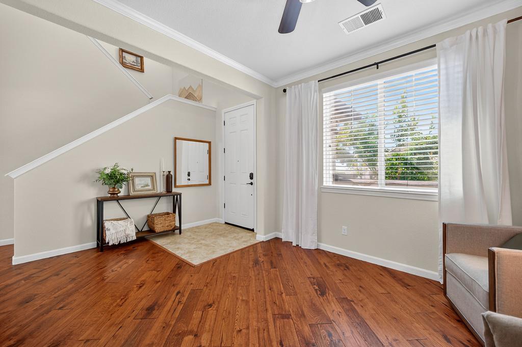 5409 Mill Water Circle Rancho Cordova, CA 95742 - Photo 11 of 48 a workspace with wooden floor and windows