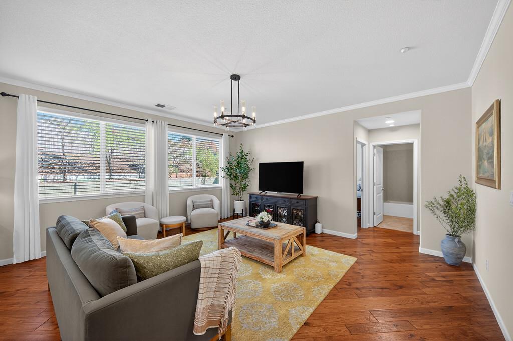 5409 Mill Water Circle Rancho Cordova, CA 95742 - Photo 13 of 48 a living room with furniture and a flat screen tv