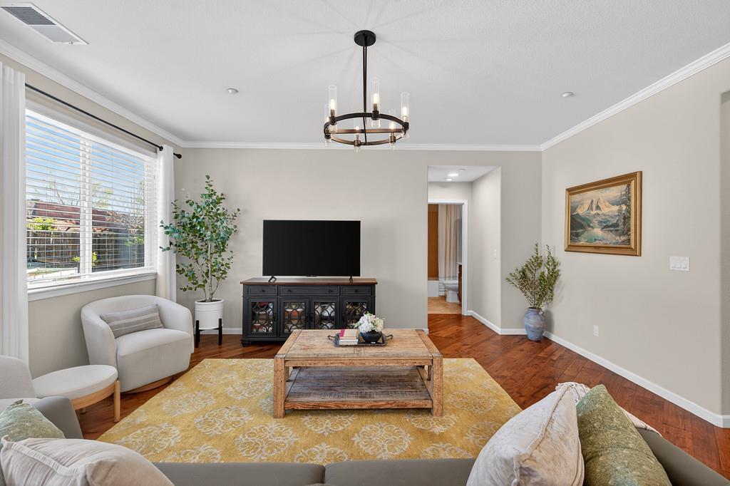 5409 Mill Water Circle Rancho Cordova, CA 95742 - Photo 14 of 48 a living room with furniture and a flat screen tv