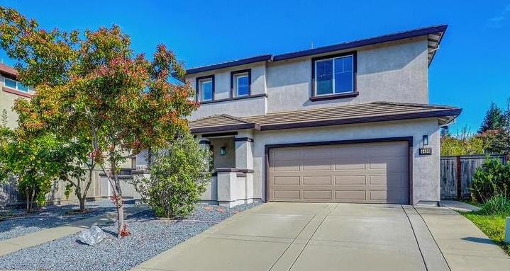 5409 Mill Water Circle Rancho Cordova, CA 95742 - Photo 2 of 48 a front view of a house with garden