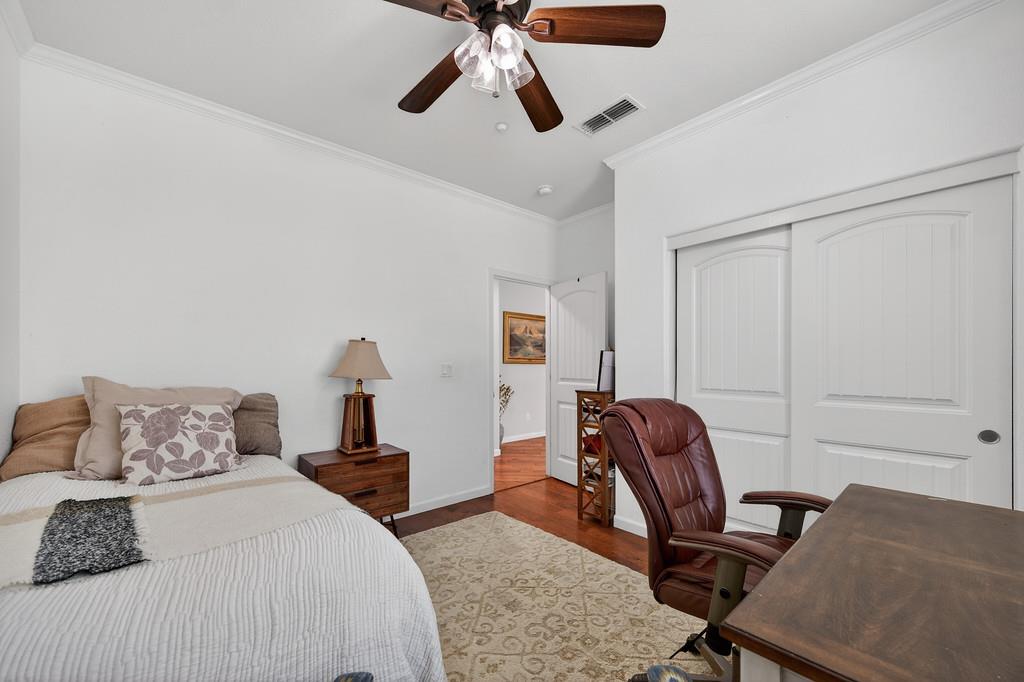 5409 Mill Water Circle Rancho Cordova, CA 95742 - Photo 23 of 48 a bedroom with a bed and furniture